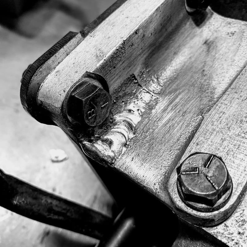 Close-up aluminum welding repair for a Belleville mobile welding request